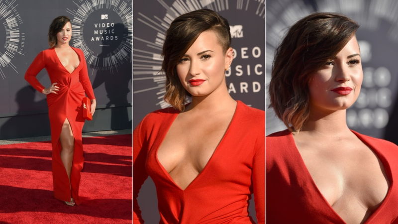 Illustration for article titled Glitter, Cleavage and Outlandish Outfits on the VMAs Red Carpet